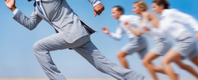 Executive Man Male running sprinting in front of runners